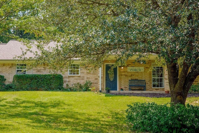 exterior space with a front lawn