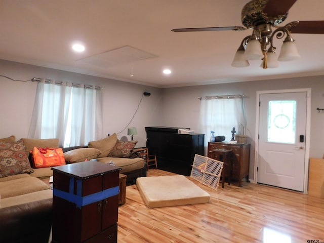 living room with recessed lighting, ceiling fan, and light wood-type flooring