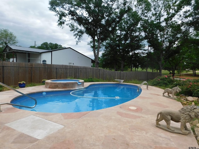 view of pool featuring a patio, an in ground hot tub, fence, and a fenced in pool