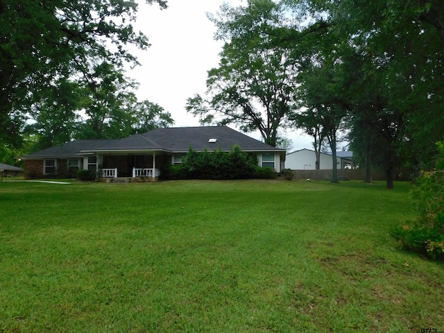 exterior space featuring a yard