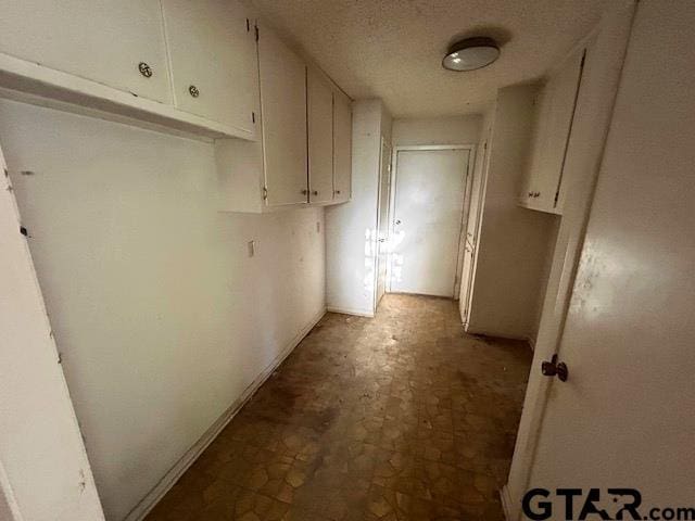hall featuring tile patterned floors