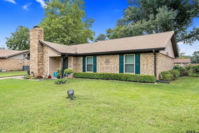 ranch-style house with a front lawn