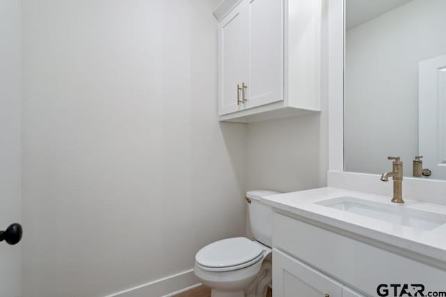 7130 Alexander Dr, Tyler, TX 75707 - bathroom featuring vanity and toilet