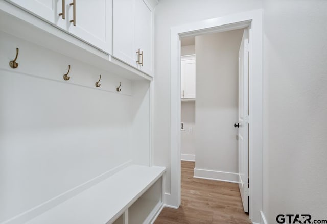 7130 Alexander Dr, Tyler, TX 75707 - mudroom featuring wood finished floors and baseboards