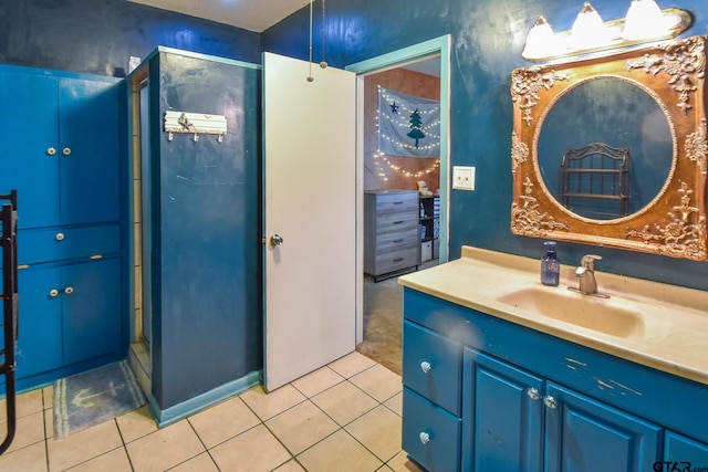 bathroom featuring vanity and tile patterned flooring