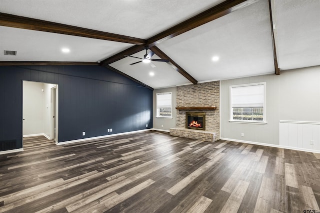 2513 Memory Ln, Tyler, TX 75701 - unfurnished living room with ceiling fan, wood finished floors, and a fireplace