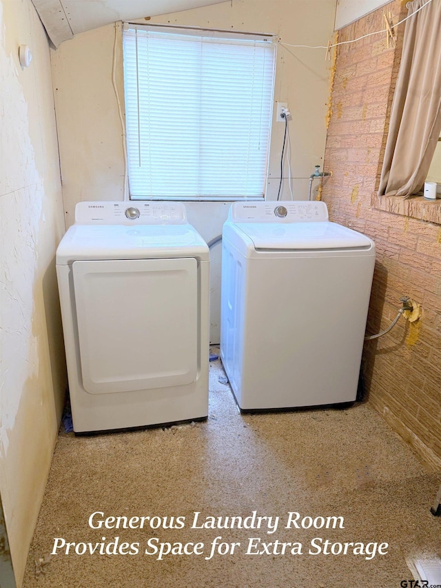 clothes washing area featuring laundry area and separate washer and dryer