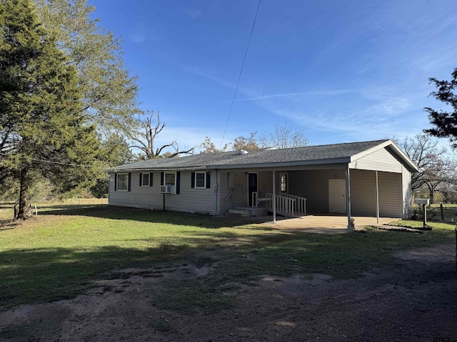 view of front of home with cooling unit and a front yard