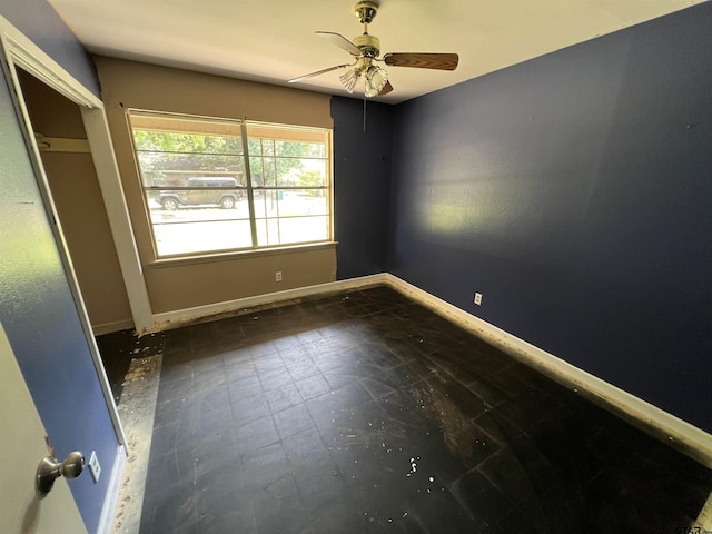 106 Hilltop Dr, Naples, TX 75568 - spare room featuring a ceiling fan and baseboards