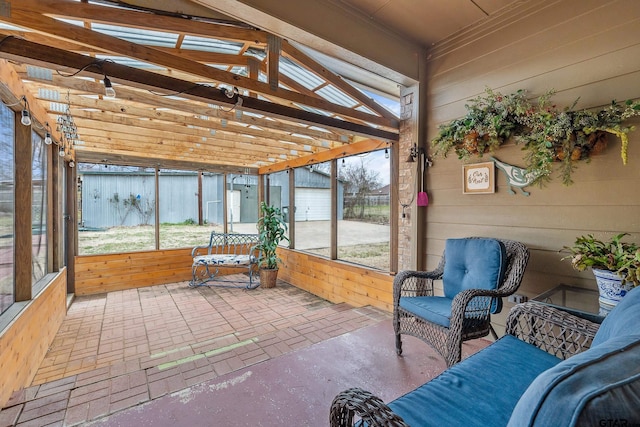 unfurnished sunroom featuring a wealth of natural light