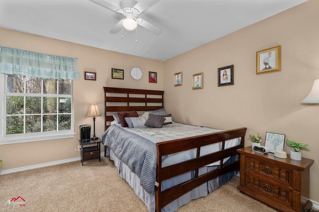 bedroom featuring light colored carpet