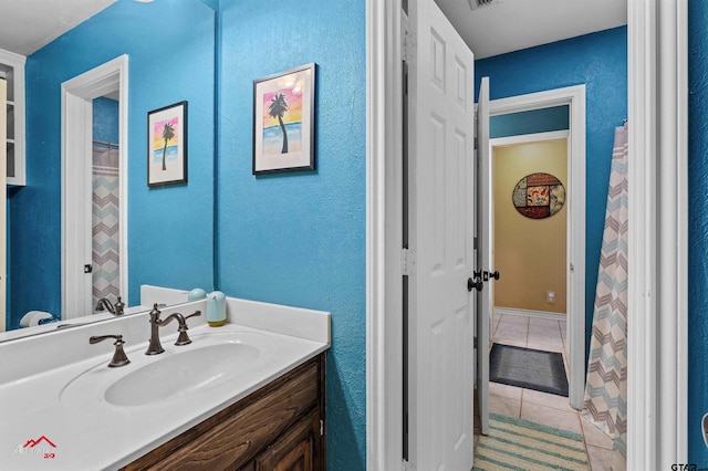 bathroom featuring vanity and tile patterned floors