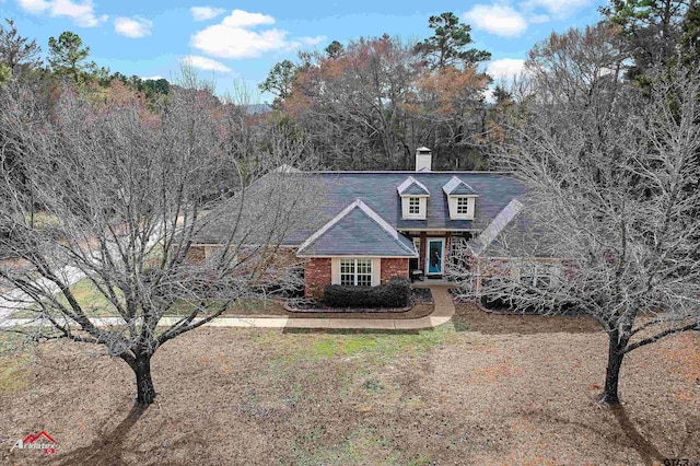 view of new england style home