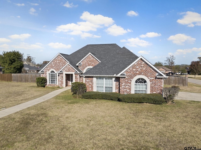 view of front of home with a front lawn