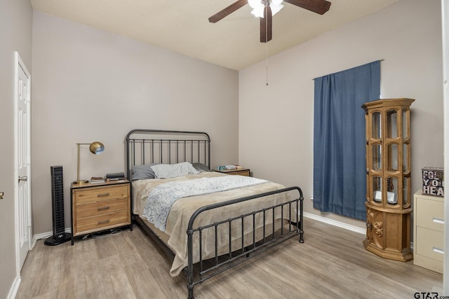 1805 San Saba Dr, Bullard, TX 75757 - bedroom with light wood-style flooring, ceiling fan, and lofted ceiling