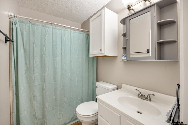 1805 San Saba Dr, Bullard, TX 75757 - full bath featuring a textured ceiling, vanity, and curtained shower