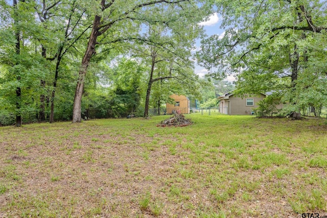 1805 San Saba Dr, Bullard, TX 75757 - view of yard with an outdoor structure