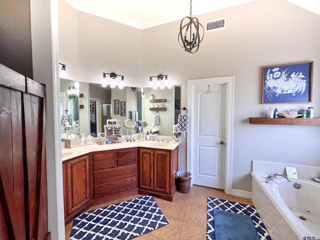 599 N Weldon St, Frankston, TX 75763 - bathroom with double vanity, a tub with jets, tile patterned floors, crown molding, and baseboards