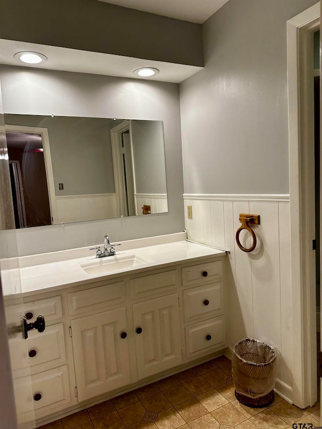 bathroom featuring vanity and tile patterned flooring