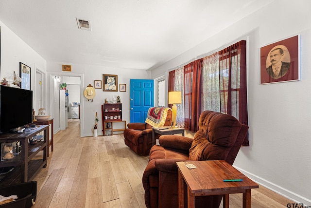 298 Butler St, Rusk, TX 75785 - living area featuring light wood-style flooring and baseboards
