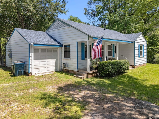 298 Butler St, Rusk, TX 75785 - ranch-style home featuring an attached garage, a shingled roof, a front lawn, and a porch