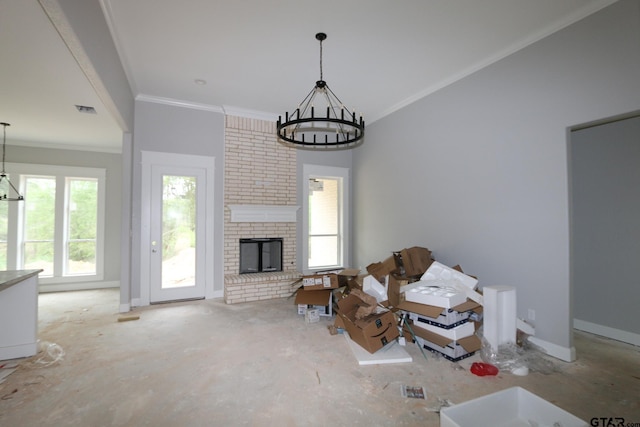 11905 Gillian Ct, Tyler, TX 75703 - living room featuring visible vents, a brick fireplace, baseboards, a notable chandelier, and ornamental molding