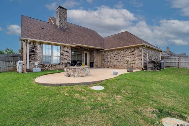 275 Babatwa Ln, Bullard, TX 75757 - rear view of property featuring brick siding, a patio area, a fenced backyard, and a shingled roof