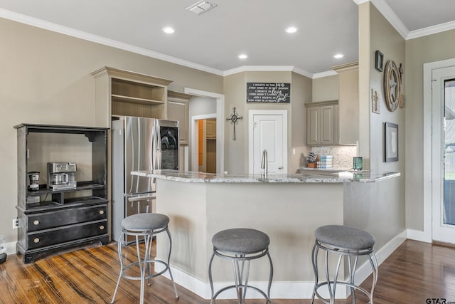 275 Babatwa Ln, Bullard, TX 75757 - kitchen with a peninsula, open shelves, dark wood-type flooring, ornamental molding, and light stone countertops