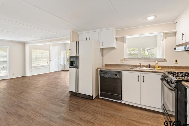 kitchen with sink, dark hardwood / wood-style flooring, white cabinets, and black appliances