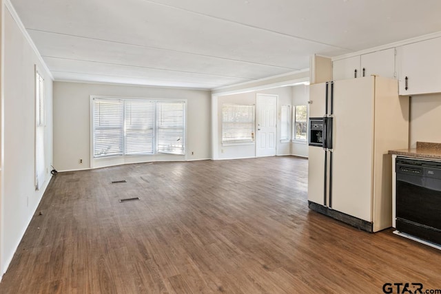 kitchen with dark hardwood / wood-style flooring, white cabinets, dishwasher, and white fridge with ice dispenser