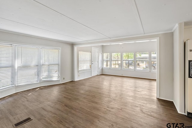 interior space with crown molding