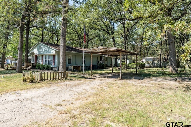 ranch-style house with a front yard