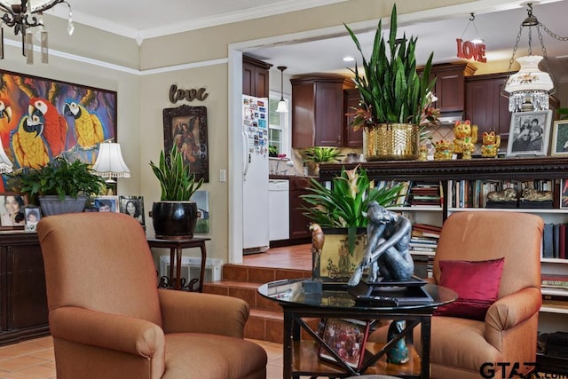 living area with ornamental molding, light tile patterned flooring, and a notable chandelier