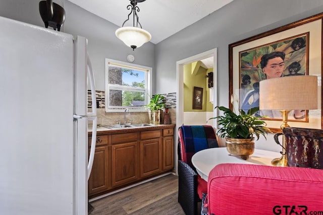 dining space with dark wood-type flooring
