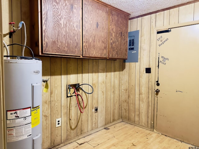 utilities with electric water heater and electric panel