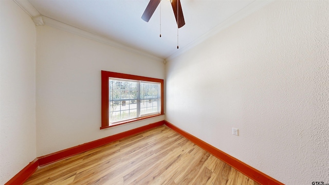 unfurnished room with crown molding, hardwood / wood-style floors, and ceiling fan