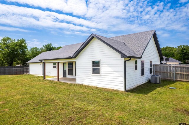 107 Oliver Wendell Ct, Mount Vernon, TX 75457 - rear view of property featuring a patio, roof with shingles, and central air condition unit