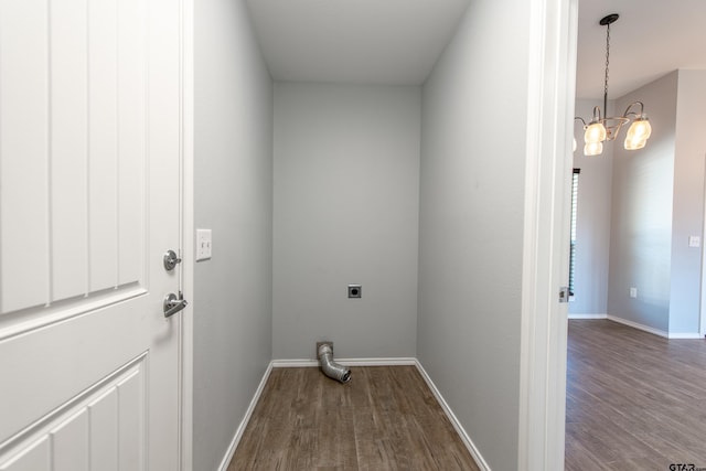 107 Oliver Wendell Ct, Mount Vernon, TX 75457 - clothes washing area featuring hookup for an electric dryer, dark wood-style floors, a chandelier, and baseboards