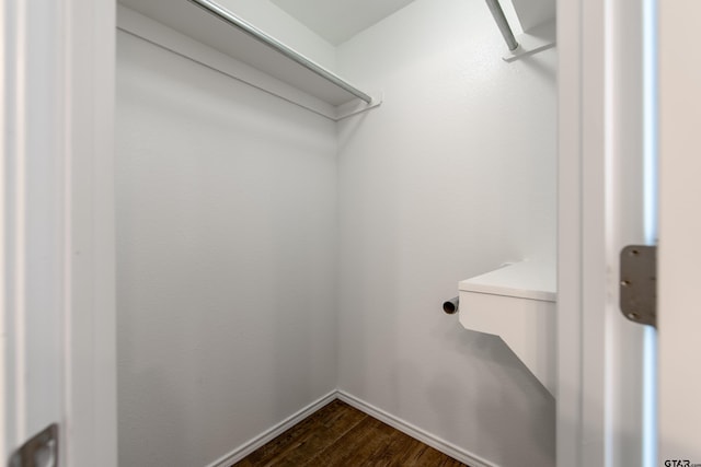 107 Oliver Wendell Ct, Mount Vernon, TX 75457 - spacious closet with dark wood-style flooring