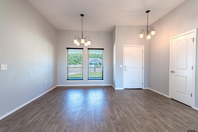 107 Oliver Wendell Ct, Mount Vernon, TX 75457 - empty room with a chandelier, dark wood finished floors, and baseboards