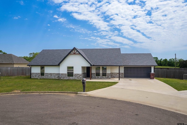 107 Oliver Wendell Ct, Mount Vernon, TX 75457 - view of front of home with concrete driveway, stone siding, a garage, and a porch