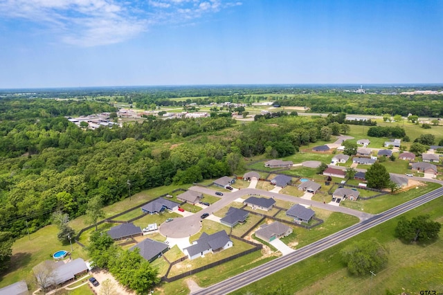 107 Oliver Wendell Ct, Mount Vernon, TX 75457 - aerial view of property and surrounding area with nearby suburban area and a heavily wooded area
