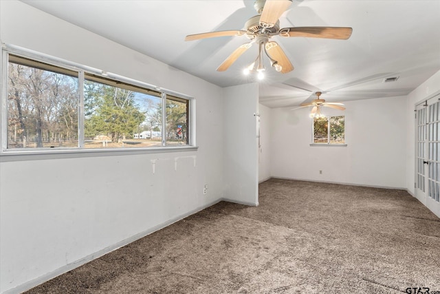 empty room with carpet and a healthy amount of sunlight