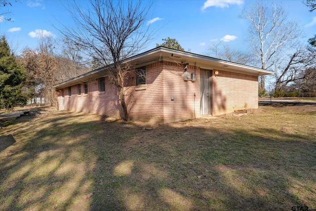 view of property exterior featuring a yard