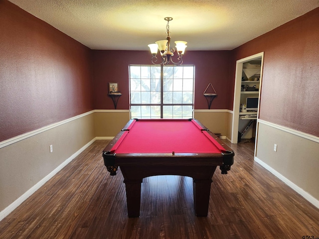 playroom with wood finished floors, baseboards, pool table, a textured ceiling, and a notable chandelier