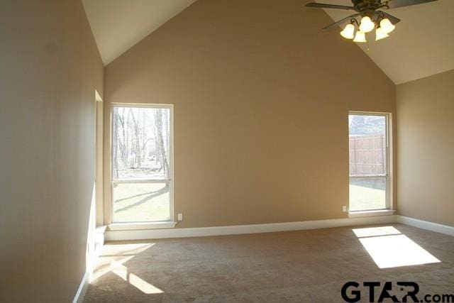 2308 Pinehurst St, Tyler, TX 75703 - unfurnished room with high vaulted ceiling, a ceiling fan, carpet flooring, and baseboards