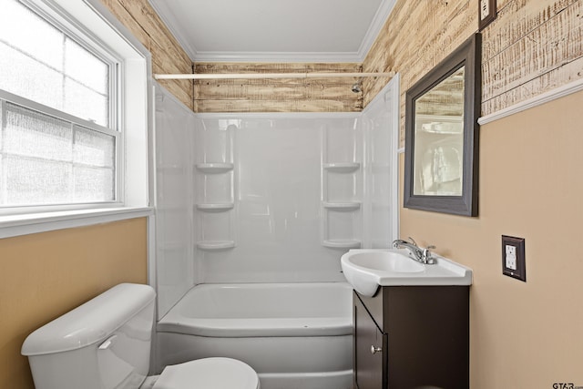 full bathroom featuring shower / tub combination, vanity, toilet, and crown molding