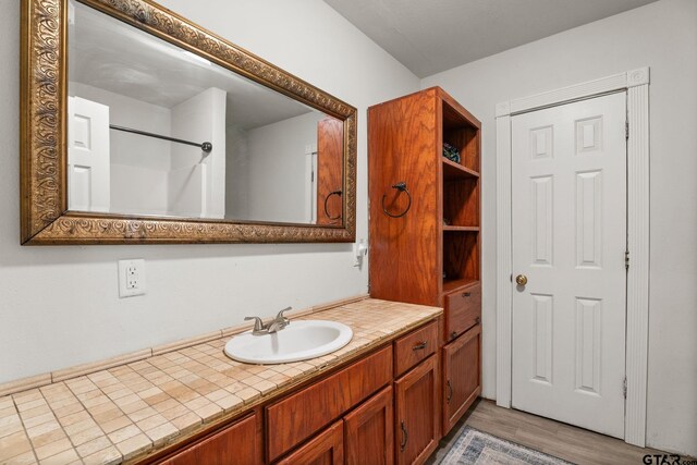 118 Lynn Creek Dr, Mabank, TX 75156 - bathroom with wood finished floors and vanity