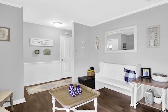 living room with crown molding and dark hardwood / wood-style floors