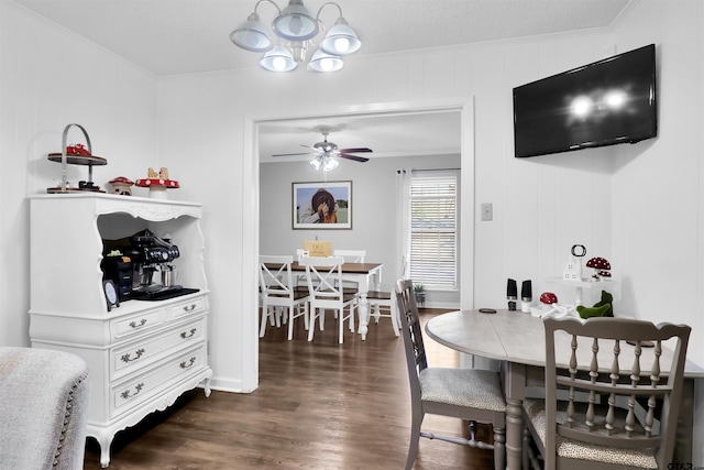 dining area with dark hardwood / wood-style flooring and ceiling fan